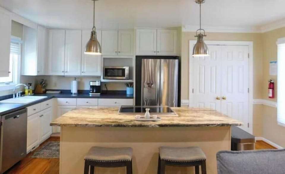 Kitchen island with seating located on second floor. 