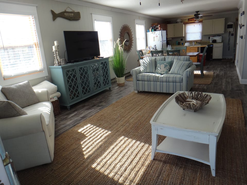 open concept living into dining and kitchen