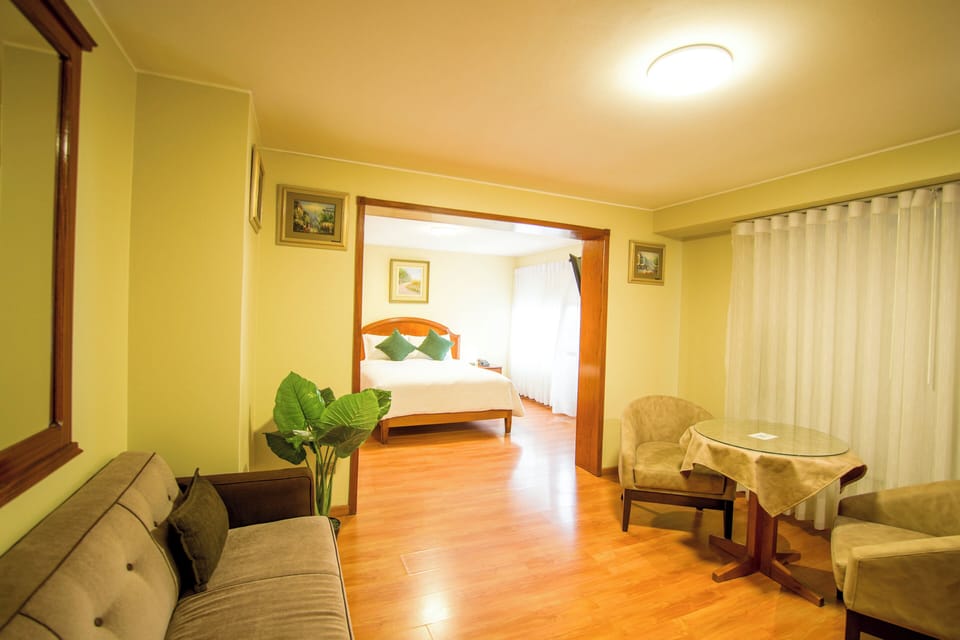 Executive Suite, City View | Premium bedding, minibar, in-room safe, desk