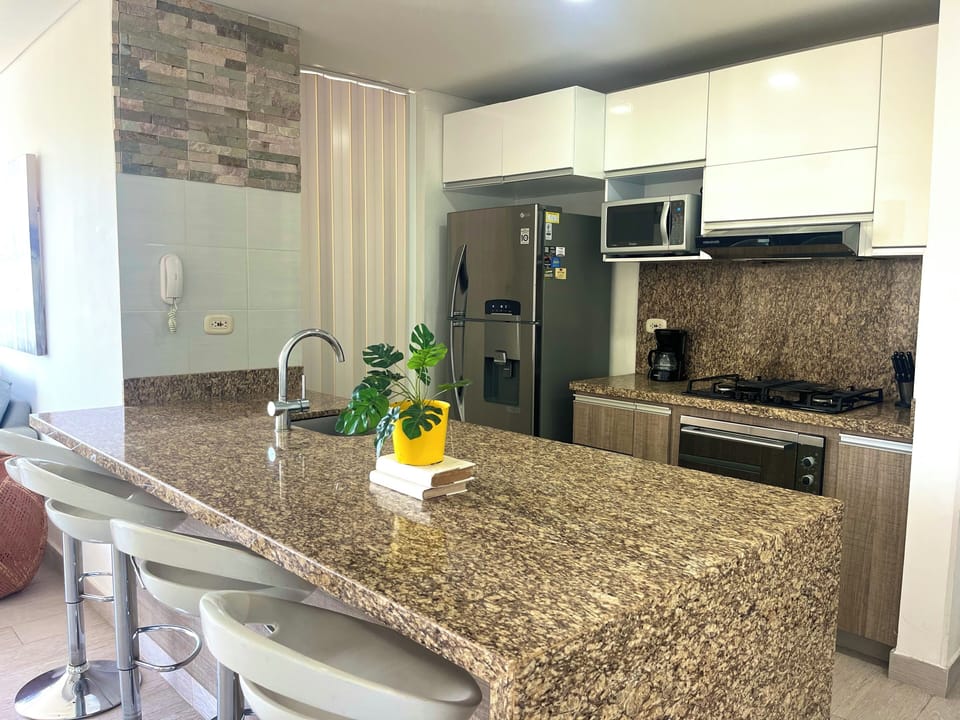 Apartment, Pool View | Private kitchen | Coffee/tea maker