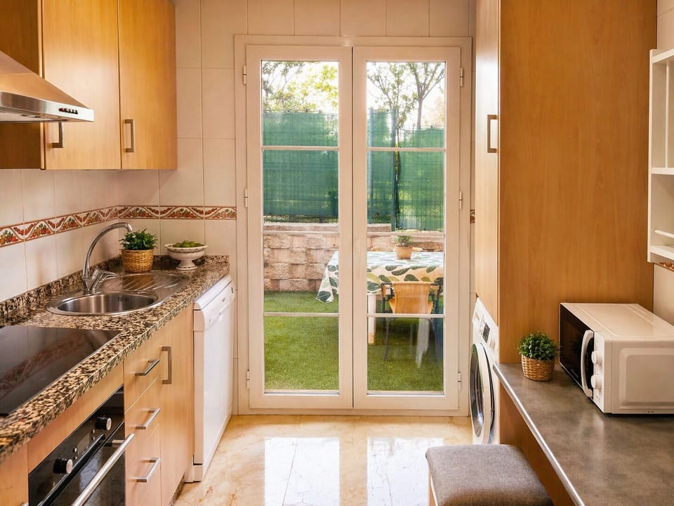 Modern kitchen with garden view