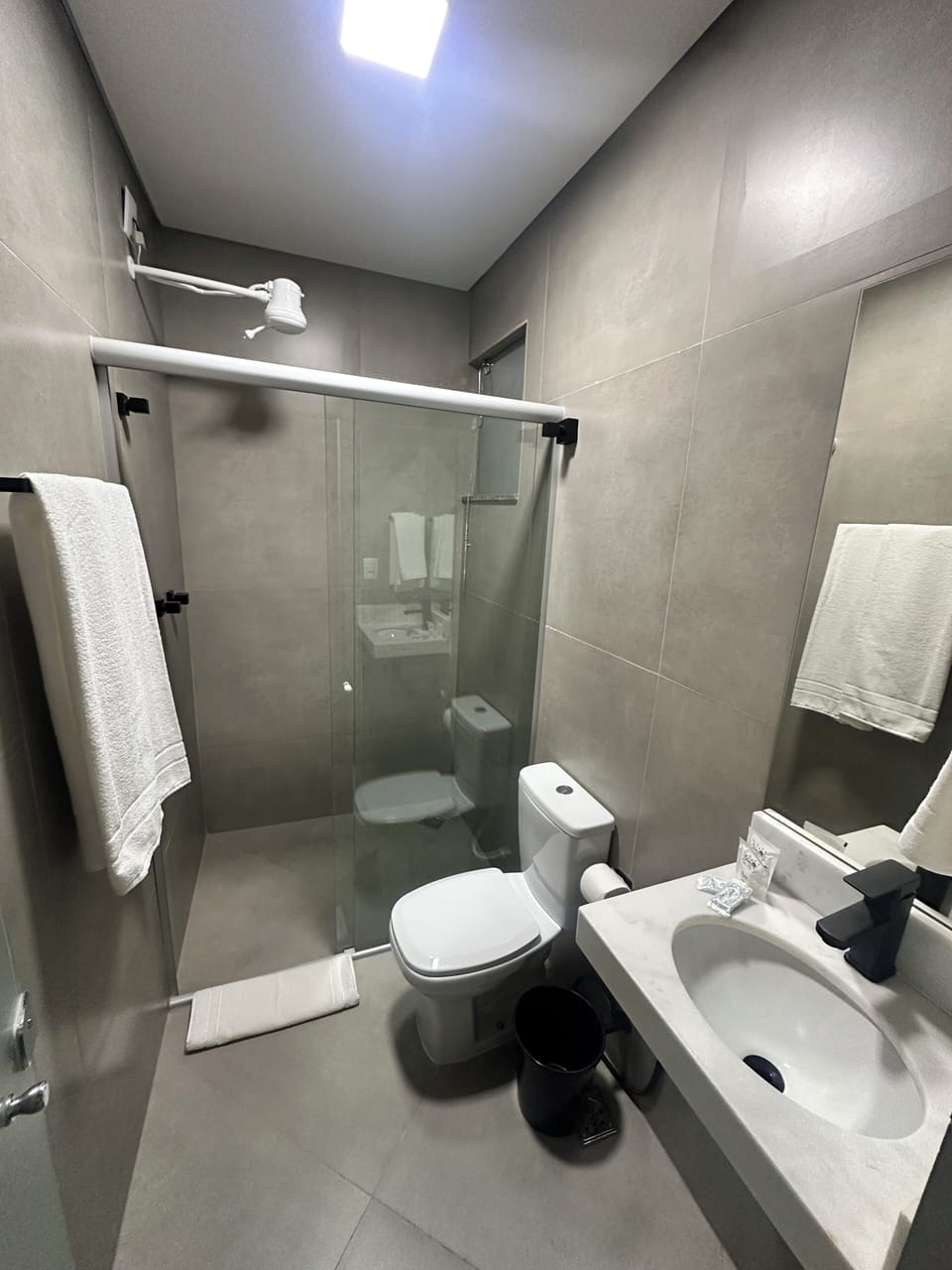 Shower, towels, toilet paper