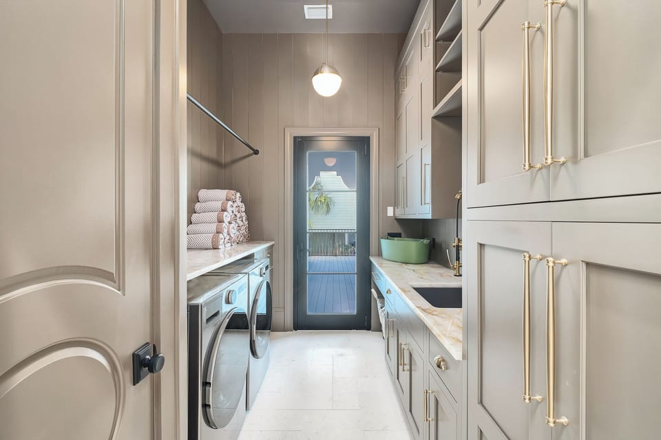 Your private laundry room features modern appliances and abundant storage, making it easy to keep your vacation wardrobe fresh.
