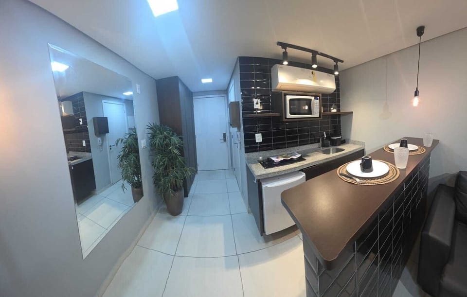 Classic Apartment | Private kitchen | Mini-fridge, microwave, stovetop, cookware/dishes/utensils