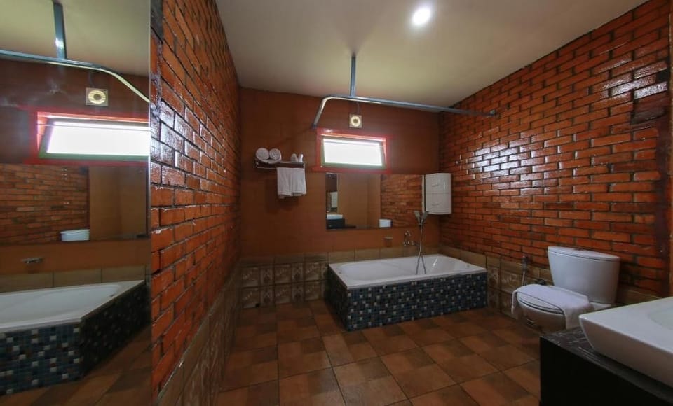 Premium Double Room, Balcony, Pool View | Bathroom | Combined shower/tub, towels, soap