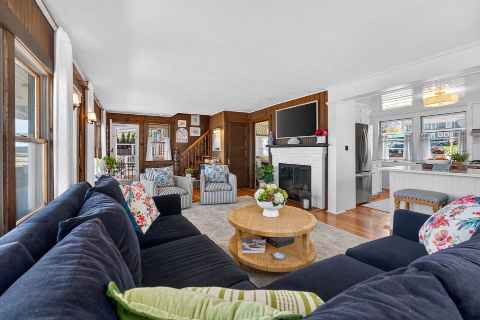 Relax in this inviting living room with cozy seating and classic coastal charm, perfect for unwinding after a day by the ocean. 🌊