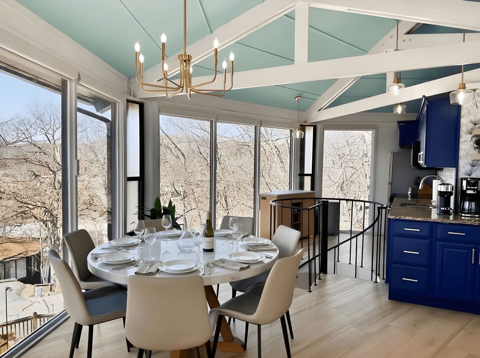 Open concept living with panoramic windows and views of the lake!