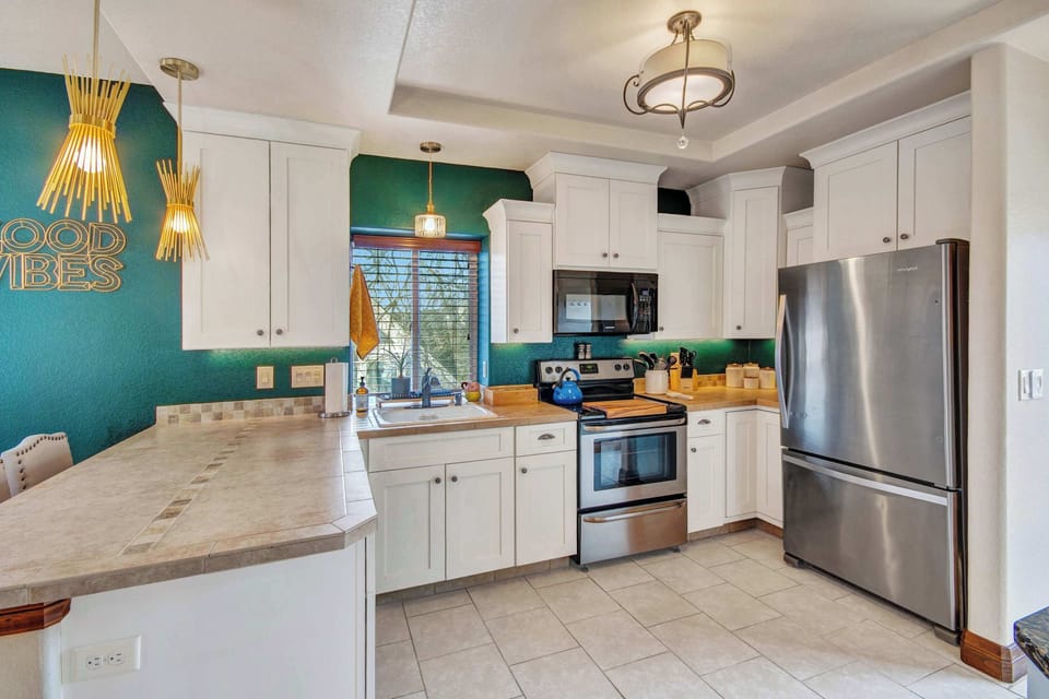 Well stocked kitchen with new appliances.