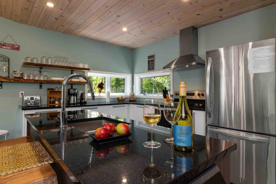 Prepare meals in the fully equipped kitchen with generous counter space.