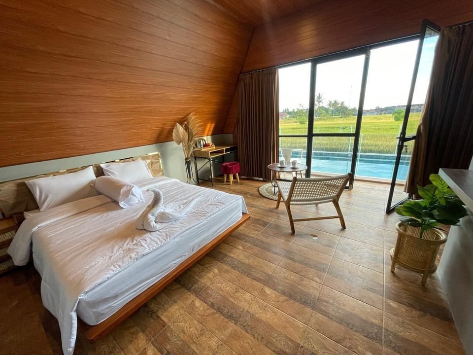 Deluxe Room, Patio, Pool View | Individually furnished, desk, laptop workspace, free WiFi