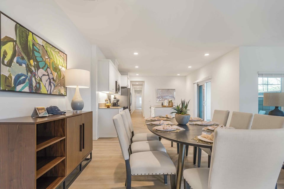Experience the flow of modern living with a direct view from the dining room to the kitchen.
