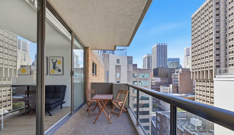 Balcony with city views and outdoor seating