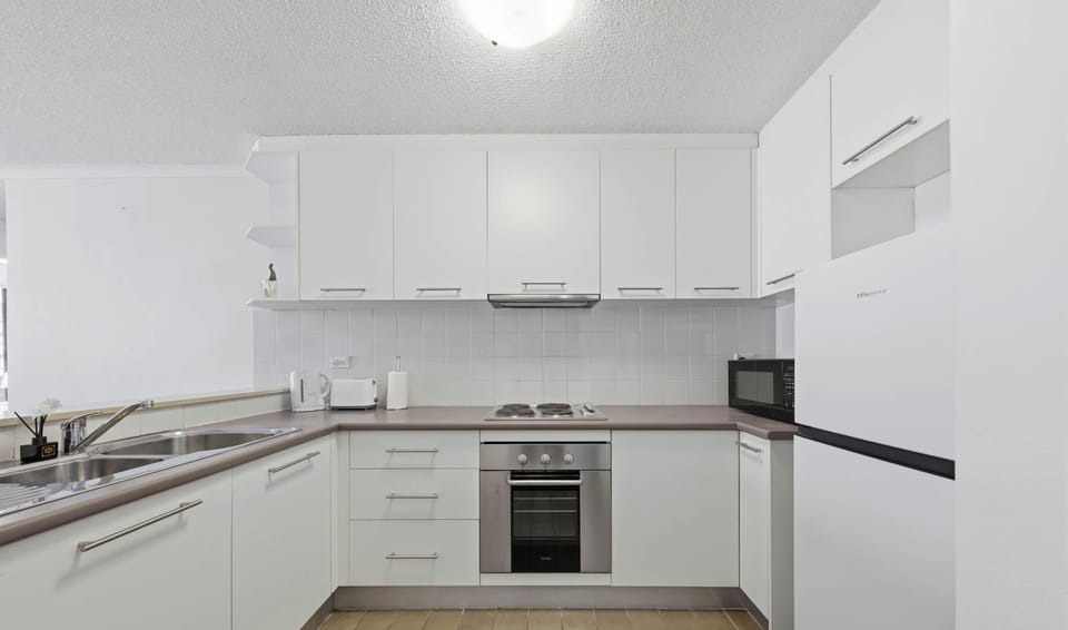 Fully equipped kitchen with ample storage
