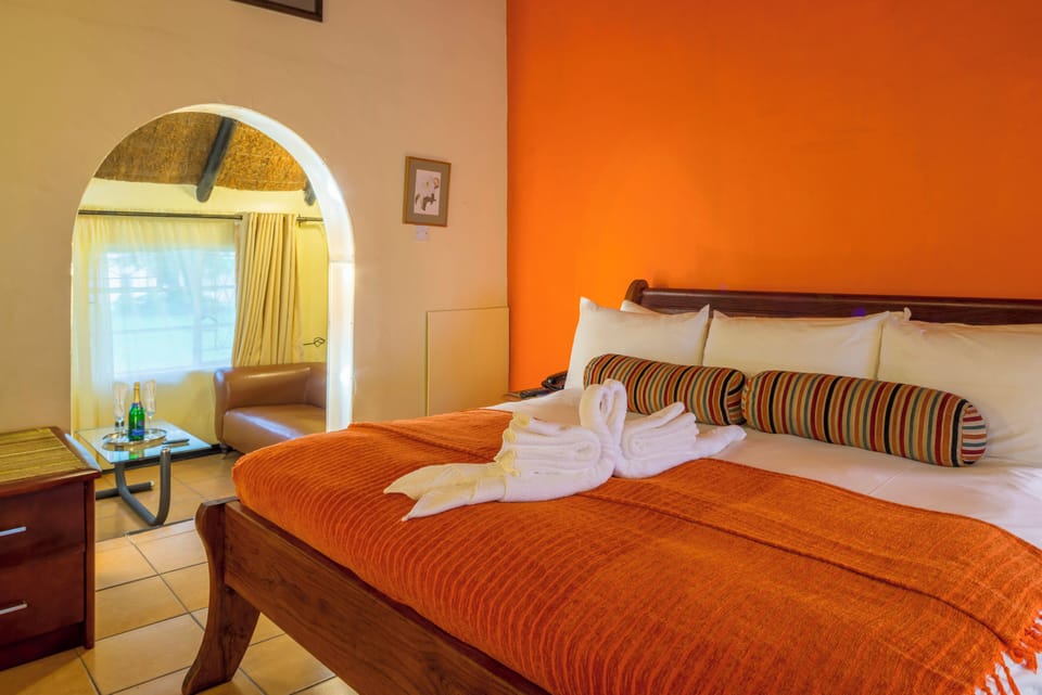 Family Room | Blackout drapes, iron/ironing board, bed sheets, alarm clocks