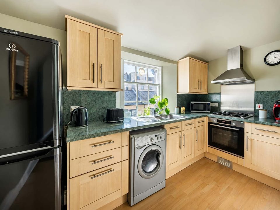 The kitchen is fully equipped to prepare a simple meal 