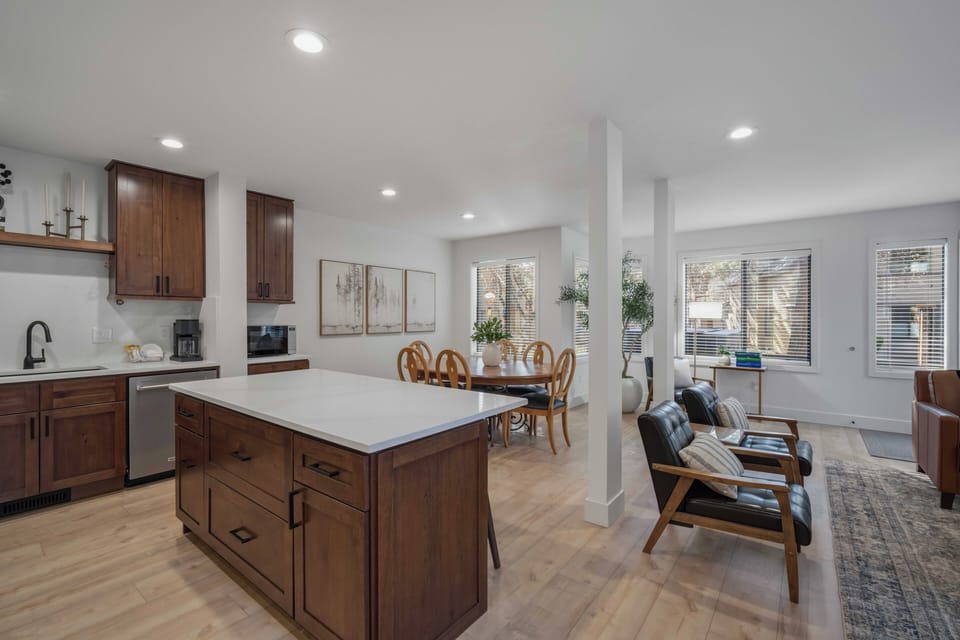 Your spacious open-plan kitchen flows seamlessly into the living area, perfect for cooking and relaxing together.