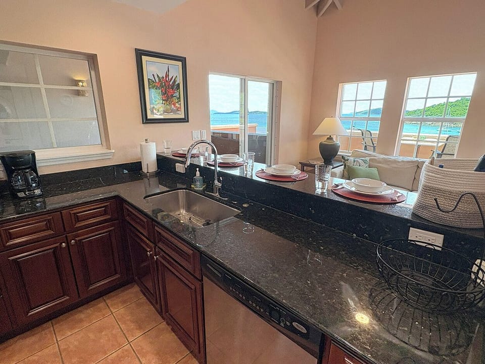 Your well equipped kitchen has beautiful ocean views 