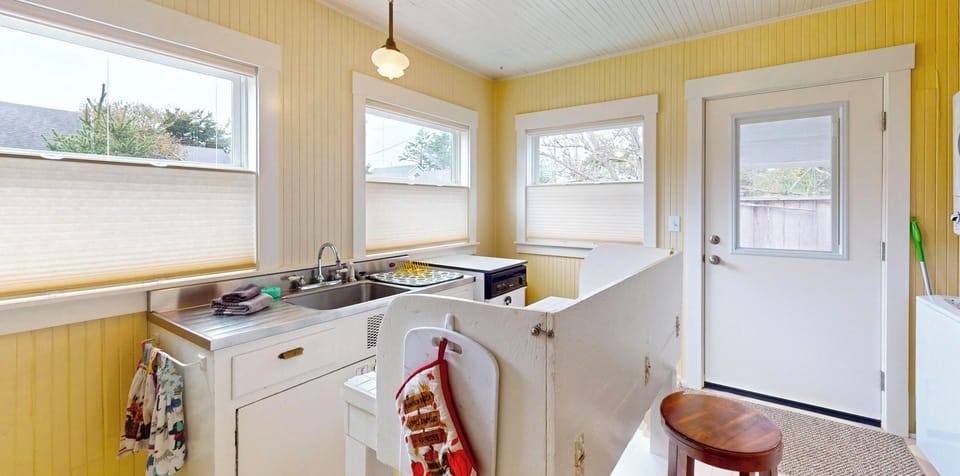 Your bright, cheerful kitchen awaits with everything you need to prepare meals and snacks during your stay.
