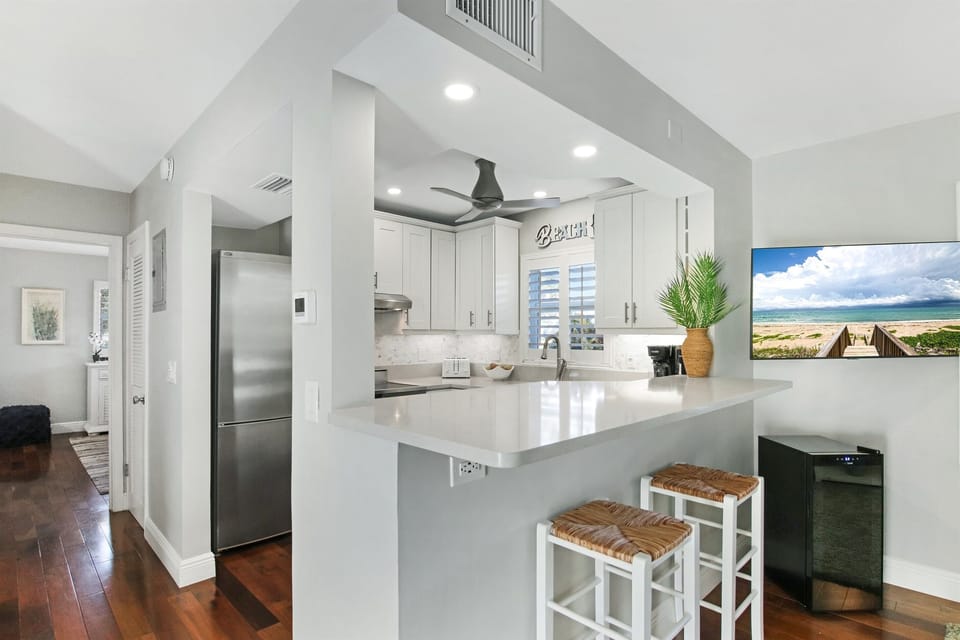 Island seating open to the kitchen