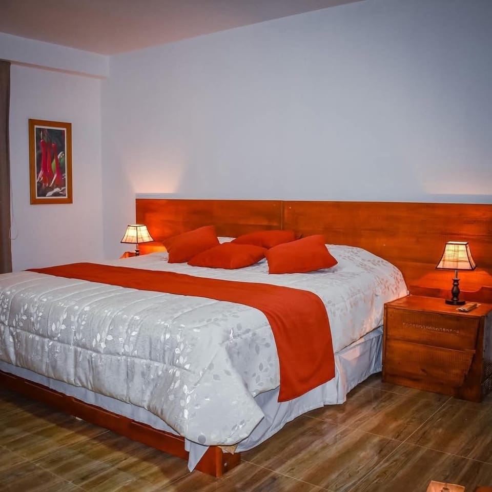 Deluxe Suite, 1 King Bed, Mountain View | Desk, blackout drapes, iron/ironing board, WiFi (free)