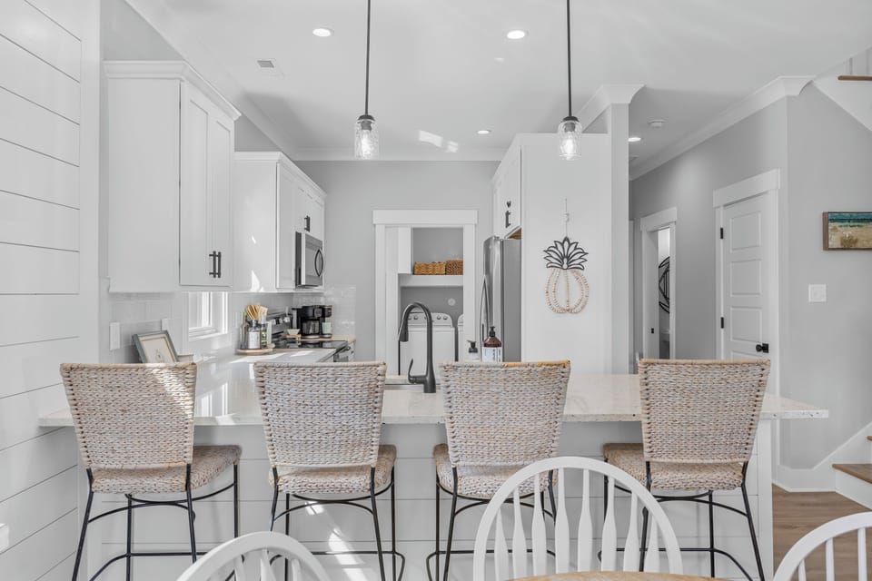 Spacious dining area ideal for family meals, game nights, and spending quality time together during your stay.