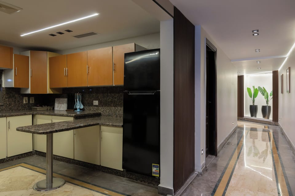 Executive Apartment, 4 Bedrooms, Air conditioning, River View | Private kitchen | Microwave, oven, stovetop, cookware/dishes/utensils