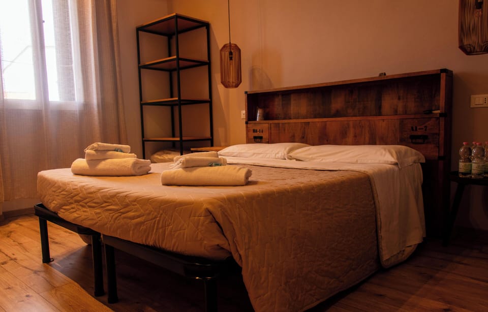 Family Room | Hypo-allergenic bedding, down comforters, blackout drapes, soundproofing