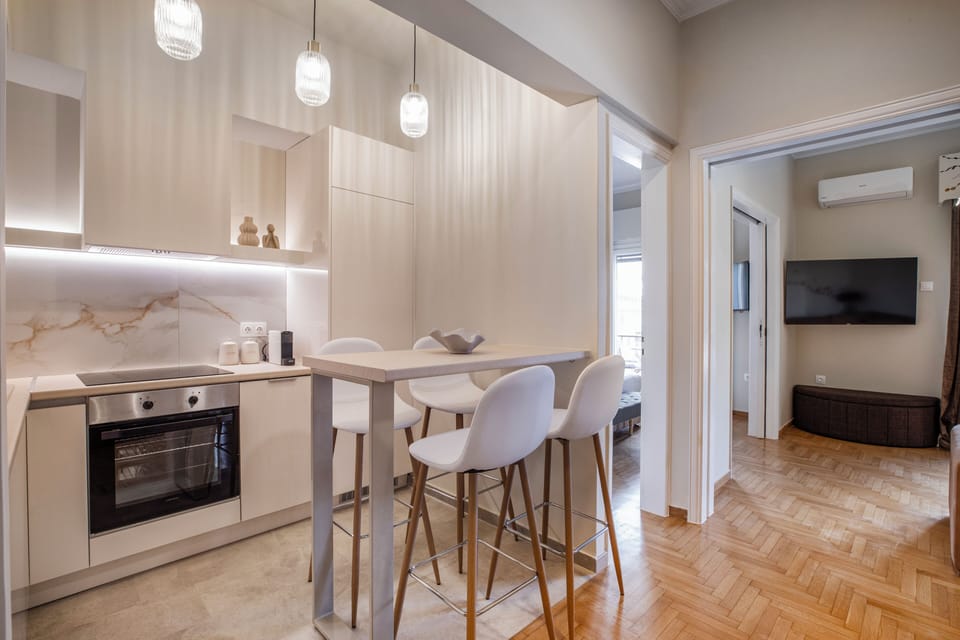 Deluxe Apartment, Balcony, City View | Private kitchen | Full-size fridge, microwave, oven, stovetop