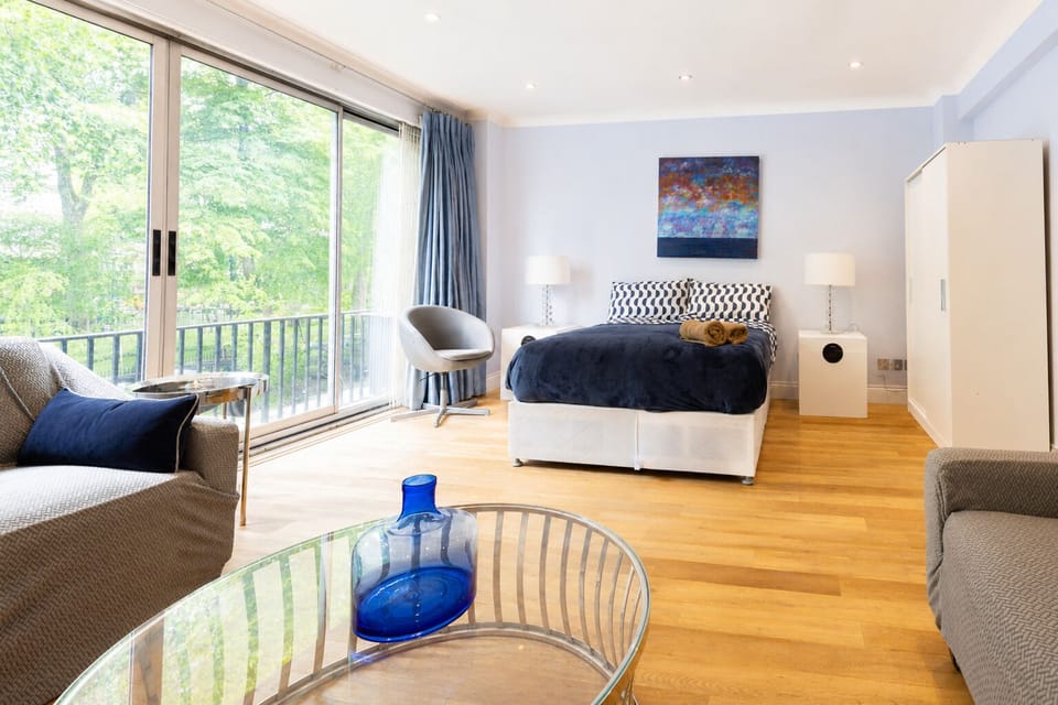 Bedroom 2 with a sitting area.