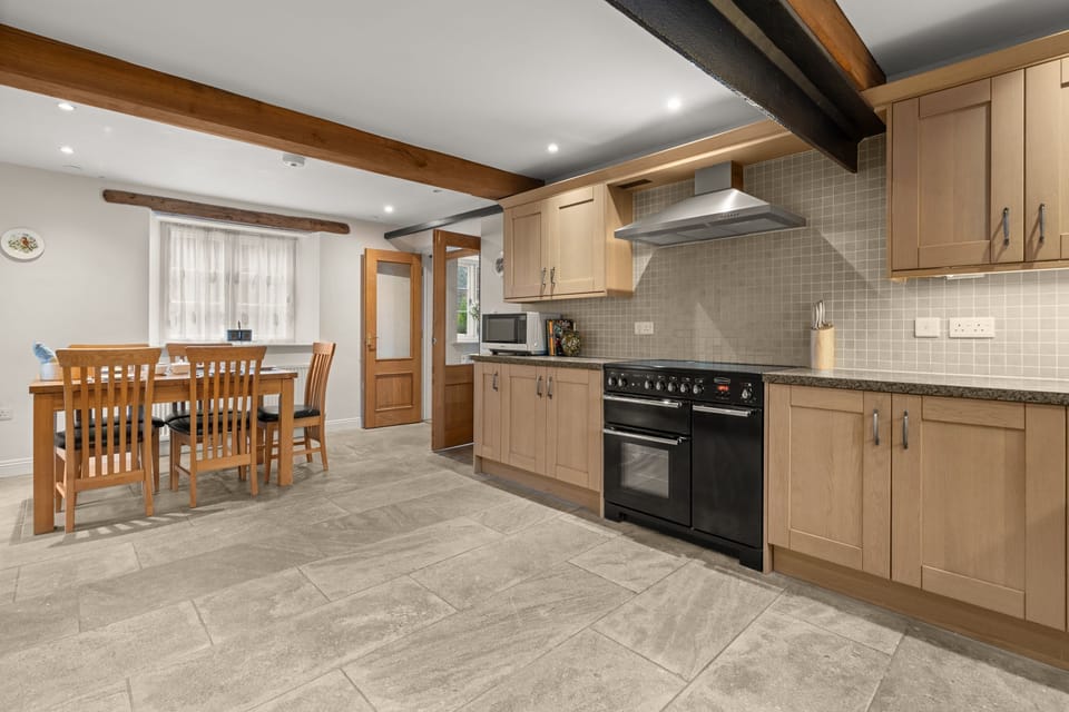 Arranged to suit your needs, Arlington's large kitchen has worktop space and cupboard storage in abundance.