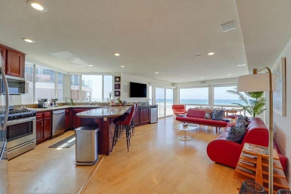 Oceanfront home with smart TVs and comfortable lounge seating for relaxing nights