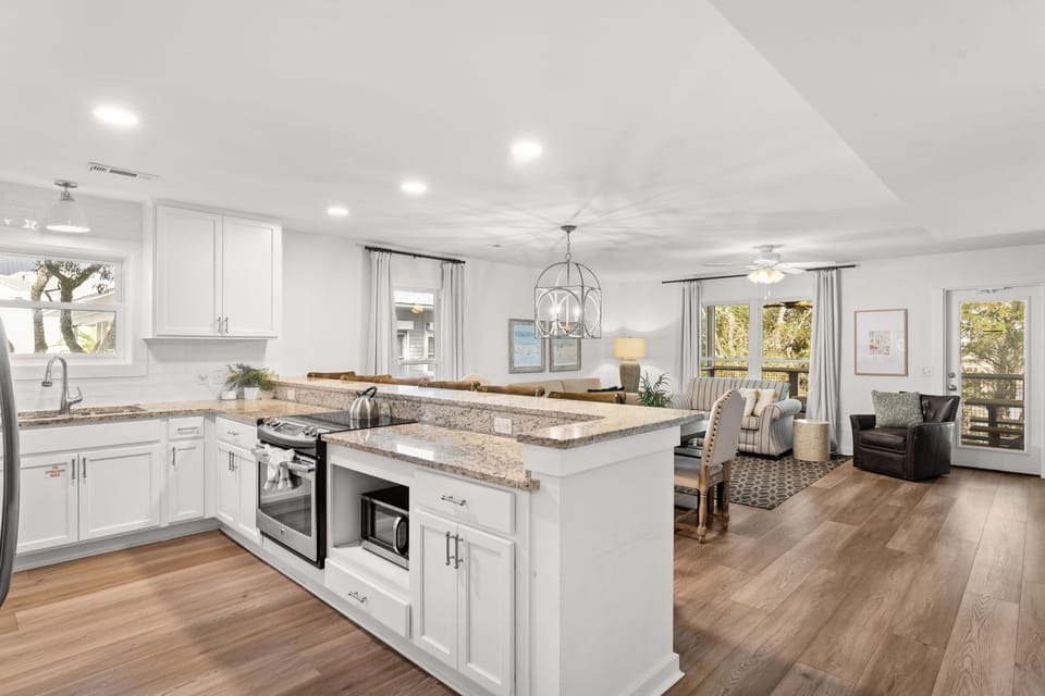 Side A, 2nd Floor: Choose between the indoor dining tables, casual barstool seating, or the lakeside screened-in porch.