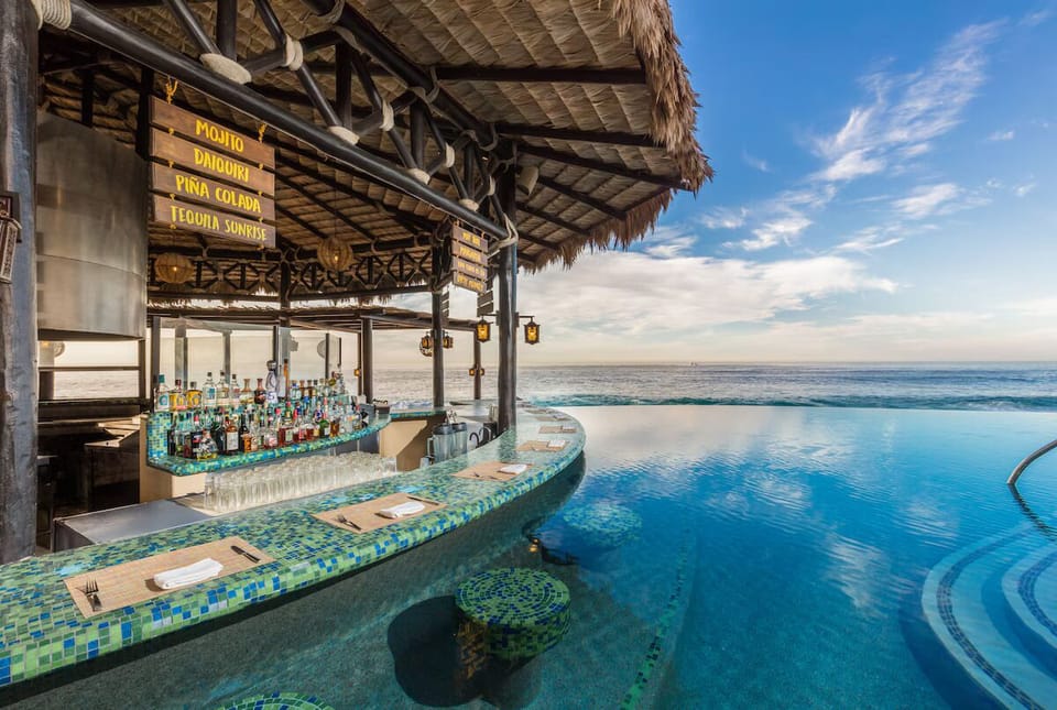 One of the infinity pools with swim up bar