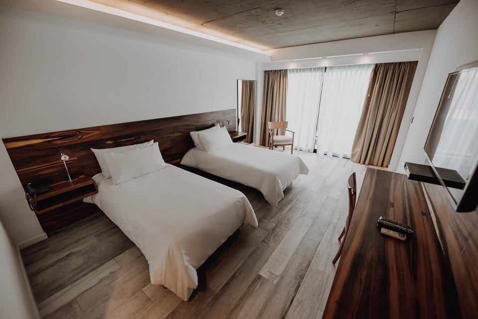 Stretch out in a spacious twin room with sleek finishes.