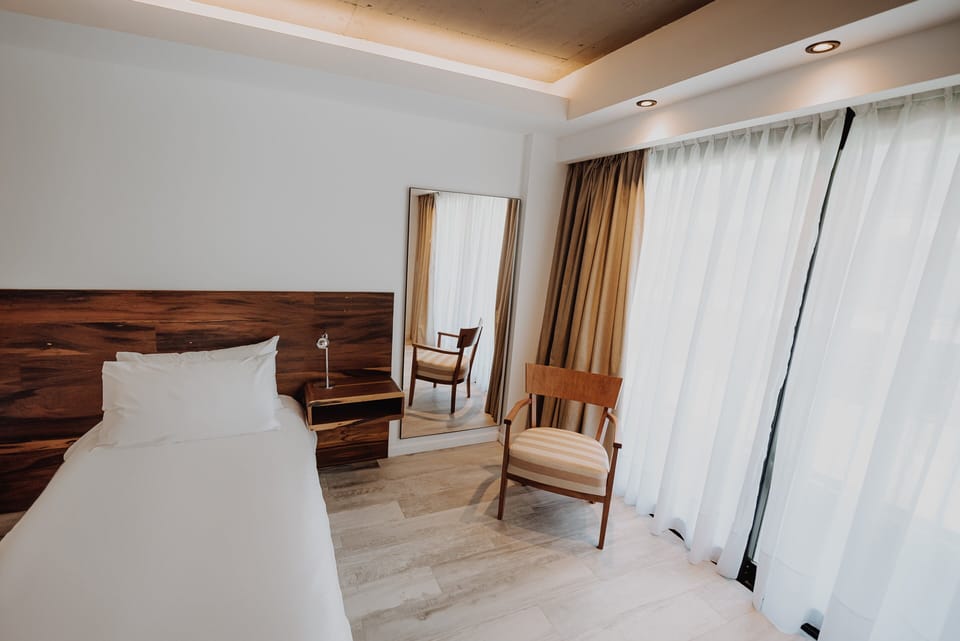 Wake up to gentle light and a cozy reading chair.