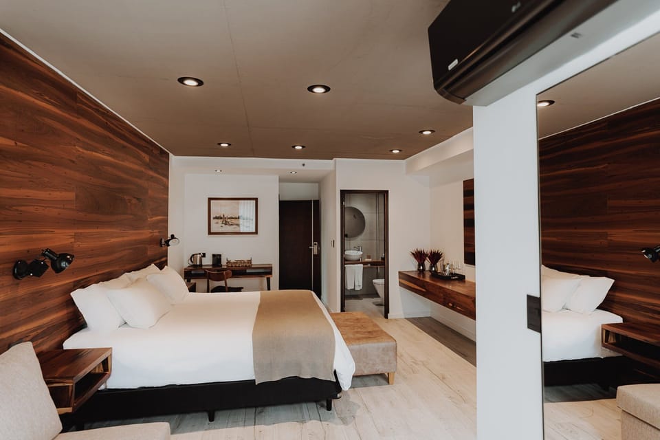 Stretch out in a spacious room with work desk convenience.