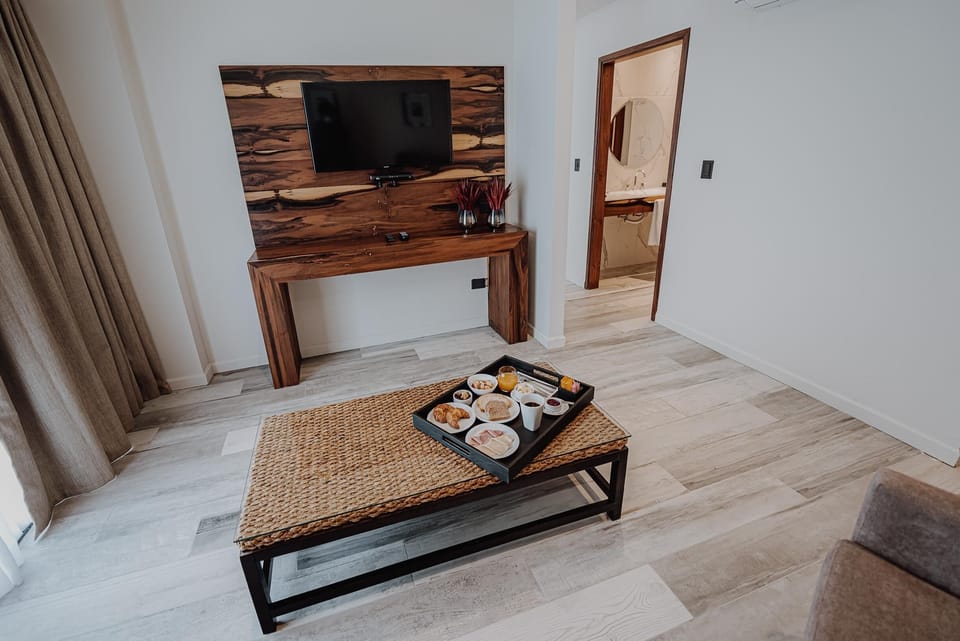Enjoy in-room breakfast on the woven coffee table.