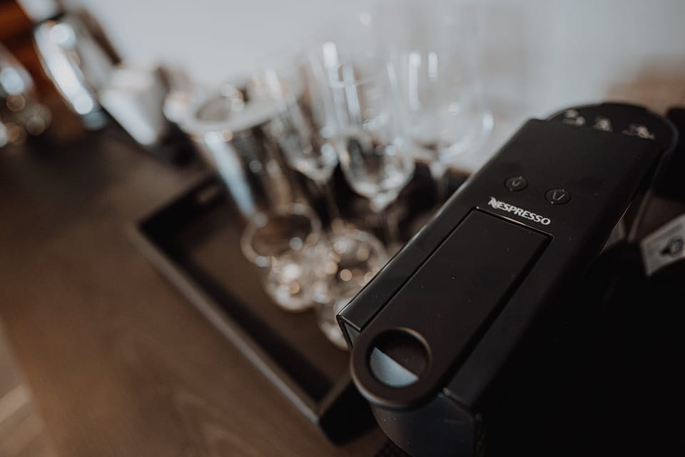 Brew fresh Nespresso and toast with sparkling glassware.