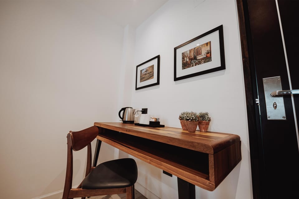 Settle in to work comfortably with an in-room tea setup.