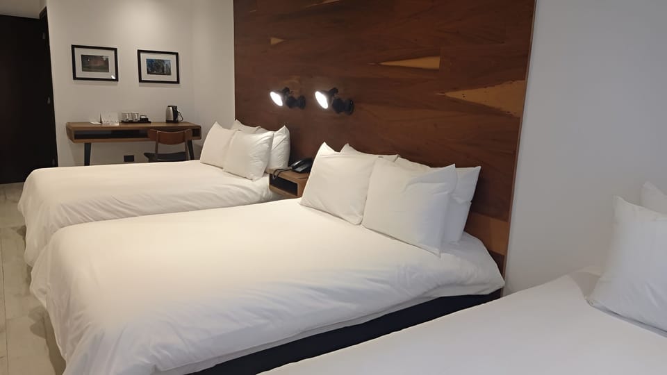 Recharge and plan tomorrow with a cozy in-room work nook.