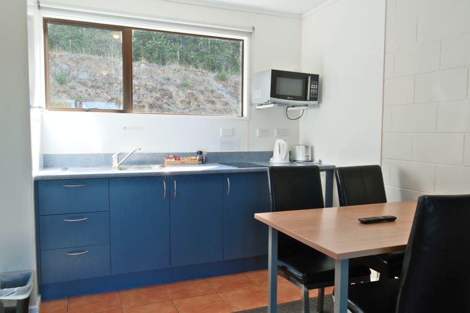 Family Studio, Patio, Garden View | Private kitchen | Mini-fridge, microwave, cookware/dishes/utensils