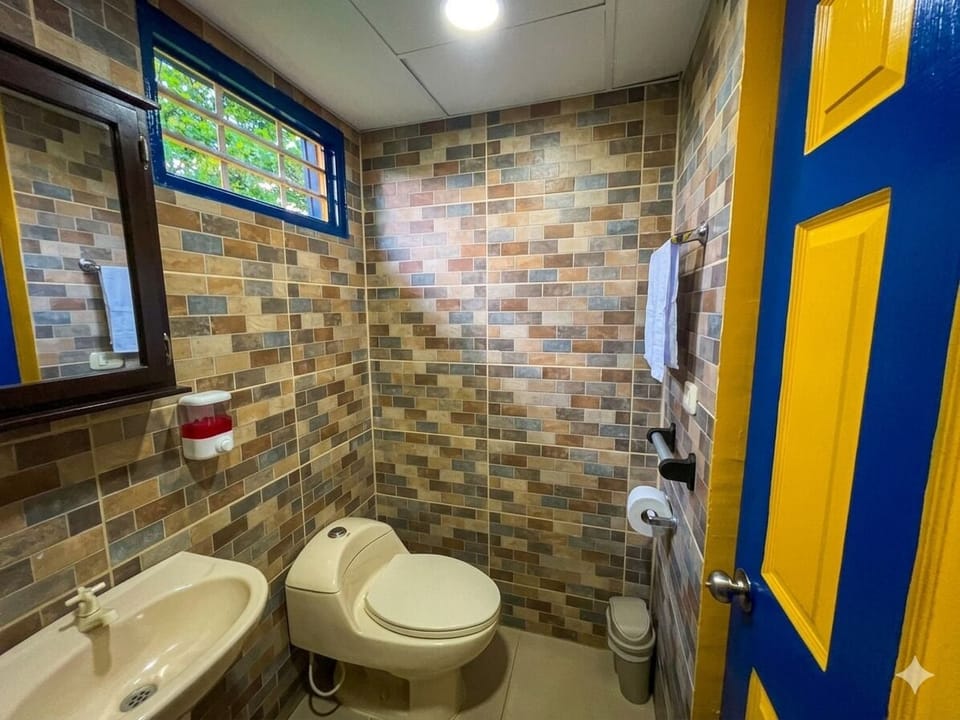 Double Room | Bathroom | Shower, towels, soap, shampoo