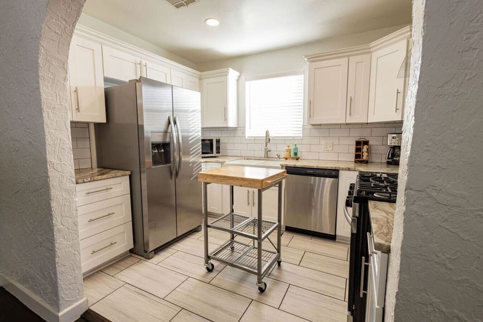 Full Kitchen with plenty of utensils for cooking