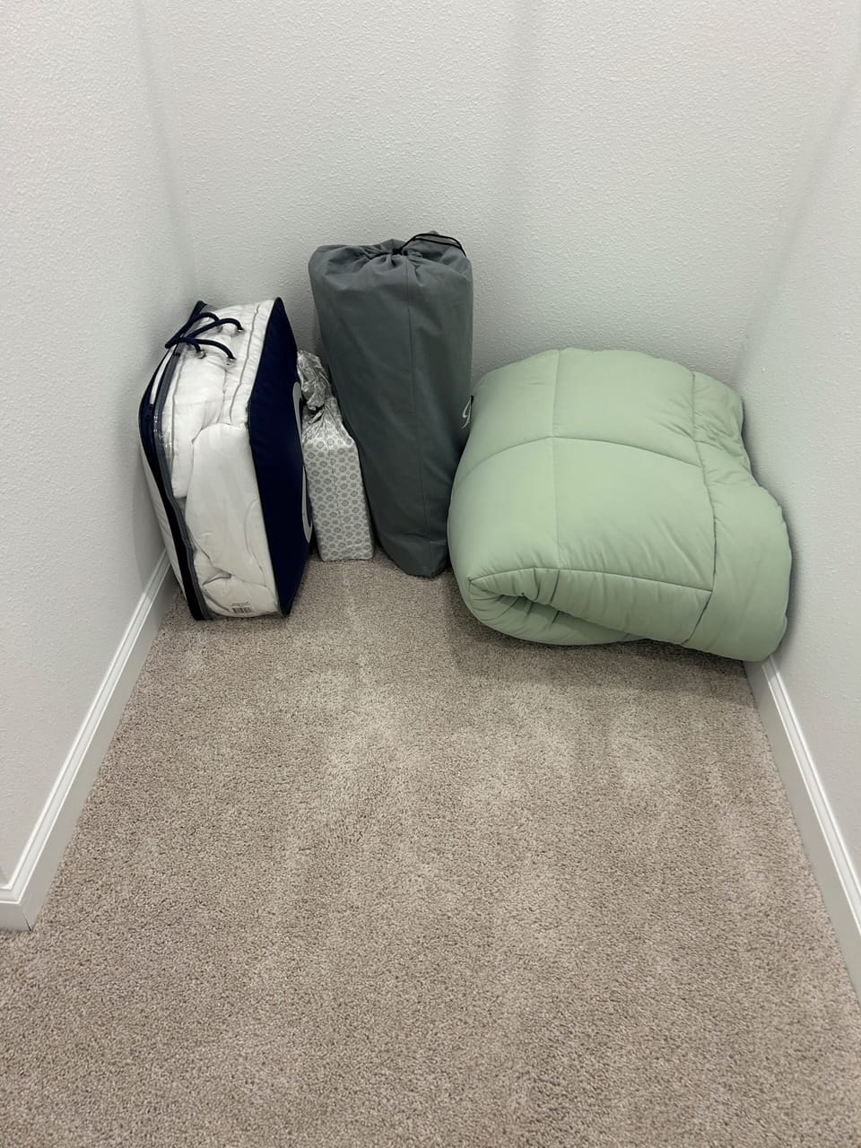 Queen Air Mattress & Bedding in Queen Room Closet.