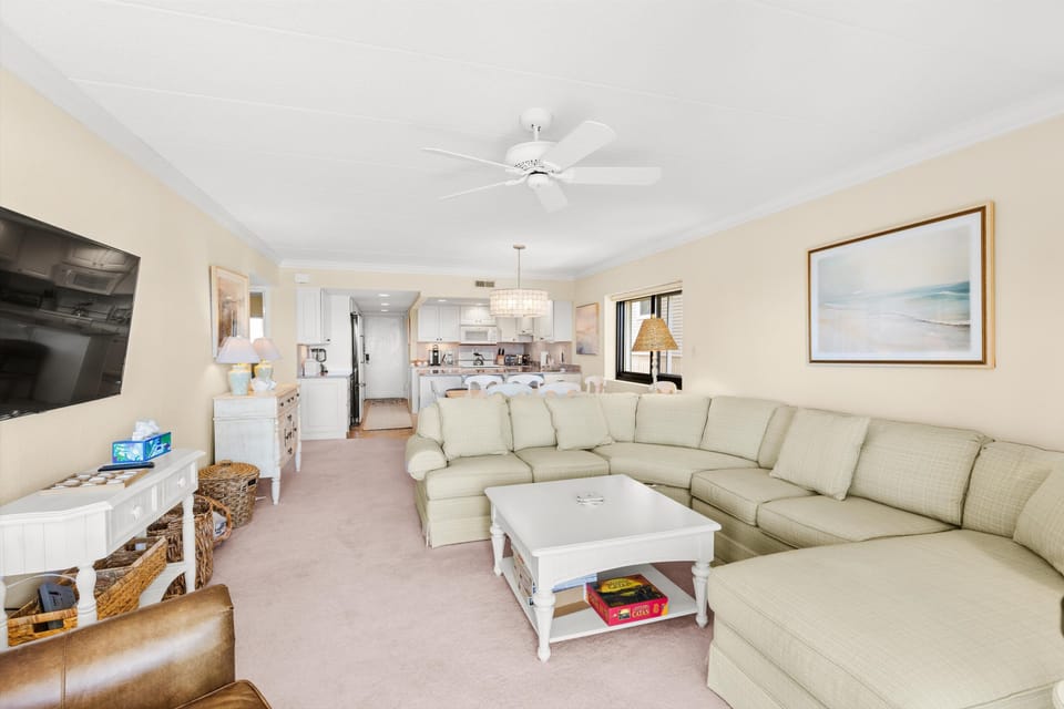 Spacious living room with sectional and Smart TV