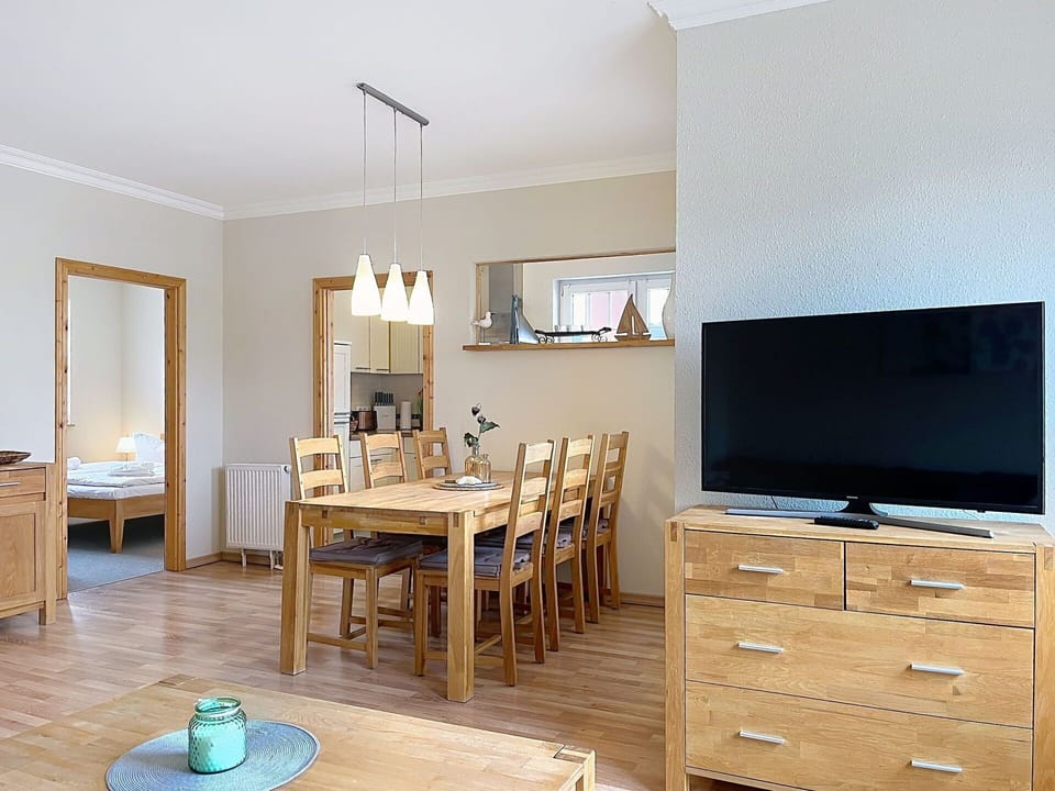 Furniture, Interior Design, Flooring, Floor, Wood, Room, Ceiling, Table, Lighting, Cabinetry
