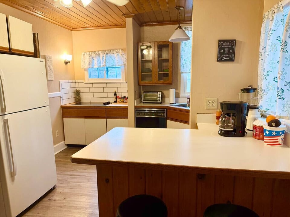 Bright, functional kitchen with ample counter space and cabinetry for storage. Features modern appliances and a practical layout, making it easy to cook, gather, and enjoy everyday meals.