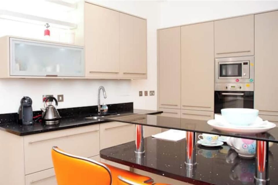 Fully equipped stylish kitchen.