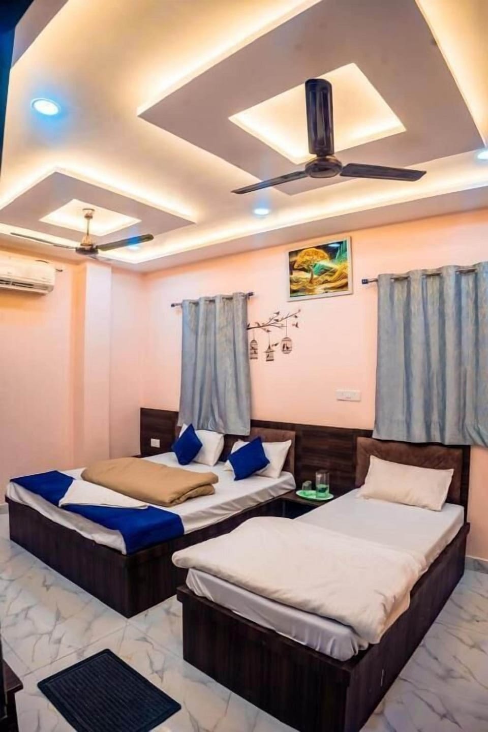 Deluxe Triple Room, City View | Desk, laptop workspace, free WiFi