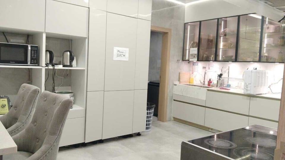 Standard Room, City View | Private kitchen | Full-size fridge, microwave, oven, stovetop